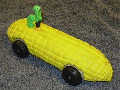 Photo: Corn on the Cob —  Carolyn H. built this corn on the cob car, and won the Third Place Unusual Design award in our 2007 Pathfinder/Trailblazer/Stockade race.