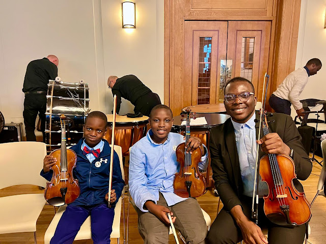 with his pupils performing at Hackney Town Hall at a concert with East London School of Music & HACS Philharmonic