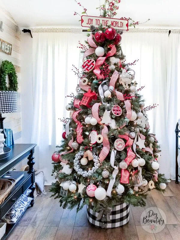 vintage style Christmas sign and berries as tree topper