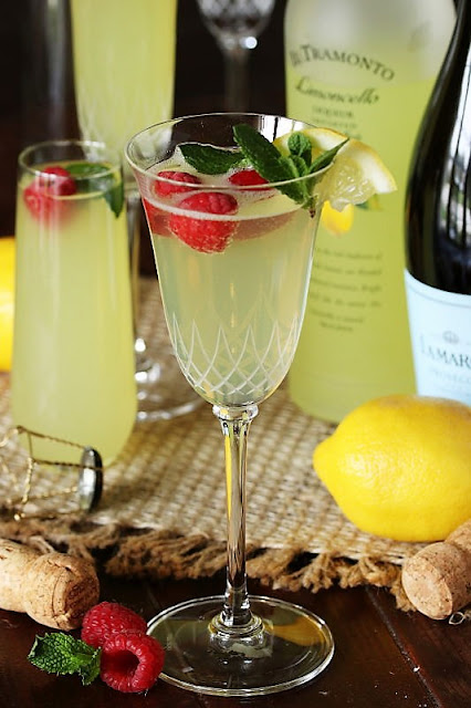 Sparkling Raspberry-Limoncello Cocktail in Crystal Wine Glass Image