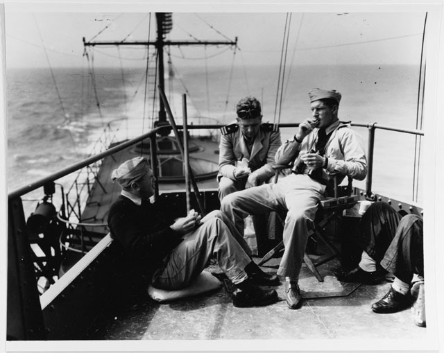 Men relaxing on USS Enterprise, 25 March 1942 worldwartwo.filminspector.com