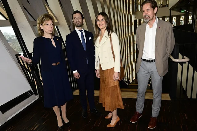 Princess Sofia wore a brown suede pleated midi skirt by &Other Stories, and an ivory wool jacket blazer by Andiata