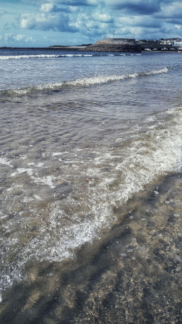 seascape from Barna waves, sand, pier at the back