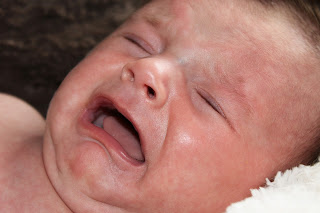 The reason some newborn babies cry and others don't cry