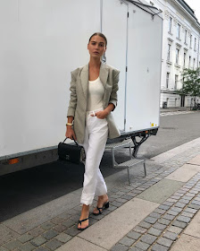 Summer Instagram Outfit Inspiration — Sophia Roe in a neutral blazer, white tank top, white cuffed jeans, and black flip flip sandals