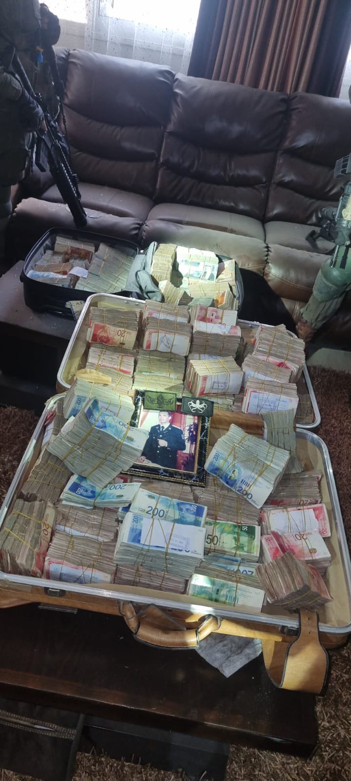 Israel Defense Forces (IDF) display "funds found inside a senior Hamas terrorist's residence"