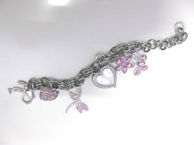 charm bracelet tattoo designs. I want my Charm Bracelet Watch from Guess 