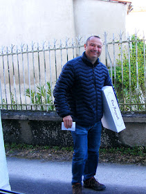 Xavier Fortin, sommelier, delivering wine to a private address during the Covid19 lockdown.  Indre et Loire, France. Photographed by Susan Walter. Tour the Loire Valley with a classic car and a private guide.