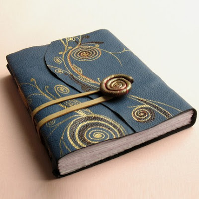 leather and polymer clay journal