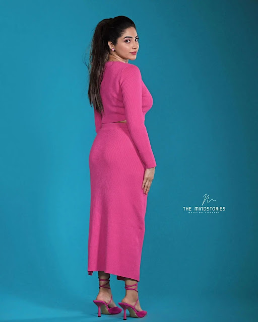 Amey Amathew looking stunning in a pink outfit, radiating elegance and charm.