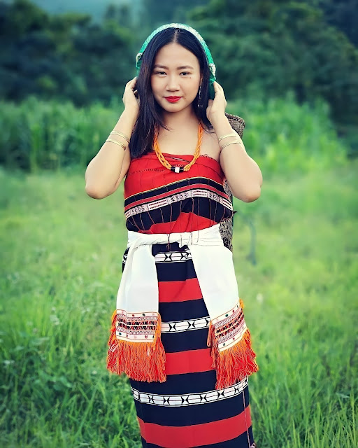 A young lady in Liangmai traditional attires