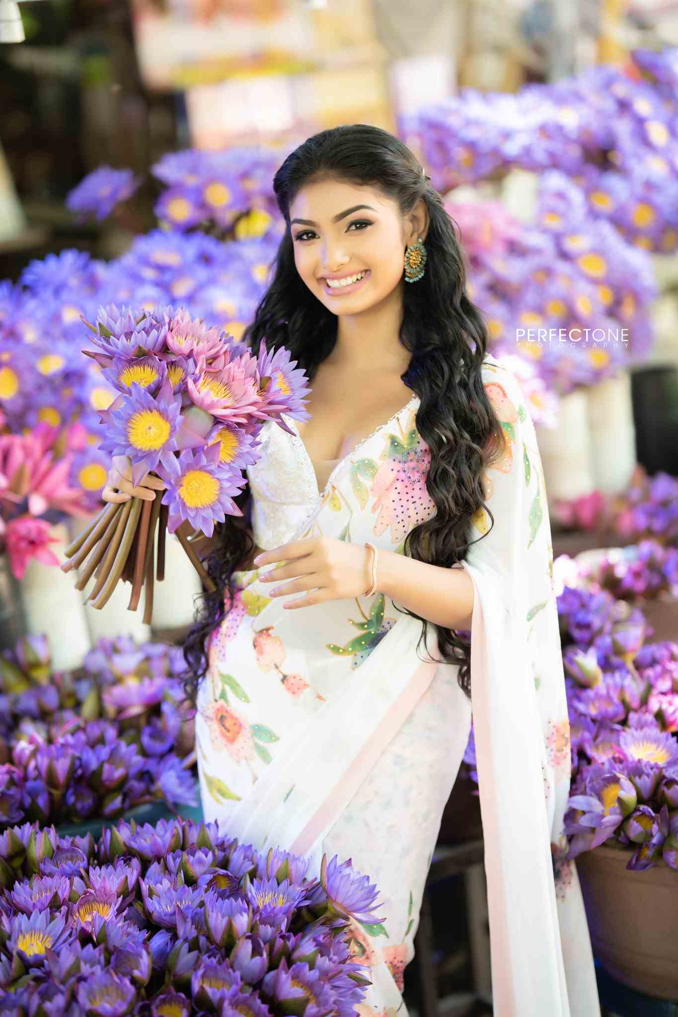 Suhandi Upethma Wosadi. Suhandi Wosadi Instagram downloads. Suhandi Upethma Wosadi Teledramas. 1990 teledrama Swarnawahini. Beautiful Girl with blue lilies. floral saree designs.