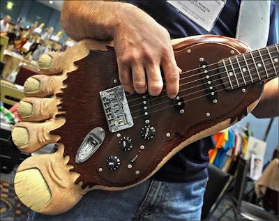 Unusual Guitar Design Seen On www.coolpicturegallery.net