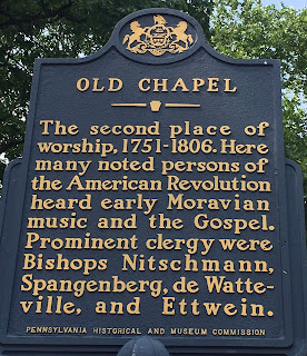 Old Chapel. The second place of worship, 1751-1806. Here many noted persons of the American Revolution heard early Moravian music and the Gospel. Prominent clergy were Bishops Nitschmann, Spangenberg, de Watteville, and Ettwein.