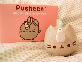 A pusheen/pusheenicorn mini tea pot or watering can 