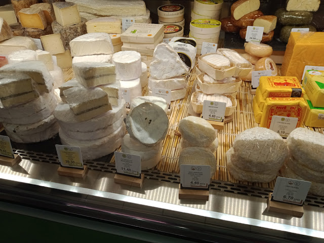 Stinky northern French cheeses at a market hall cheesemongers, Indre et Loire, France. Photo by Loire Valley Time Travel.