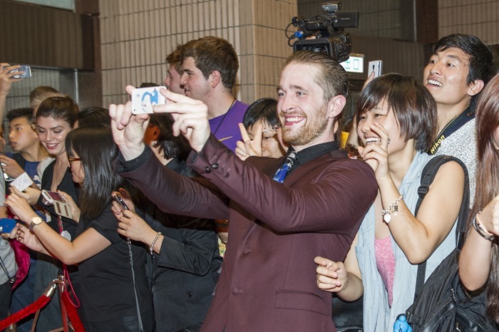 Daniel Platzman from Imagine Dragons poses with fans at the worldwide premiere screening of "Transformers: Age of Extinction"at the  on June 19, 2014 in Hong Kong, Hong Kong.