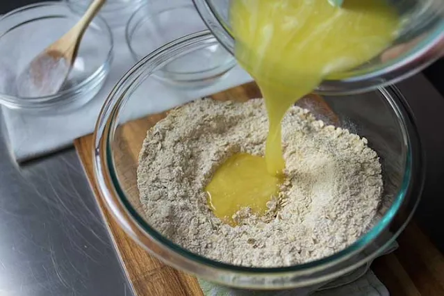 To bake oatmeal cookies - mix melted butter to dry ingredients