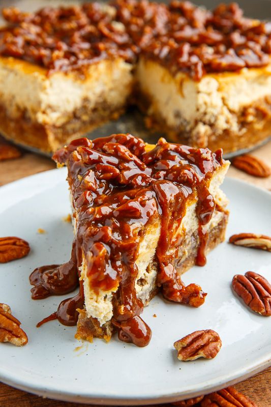 A pecan pie topped with a cheesecake topped with a pecan caramel sauce!