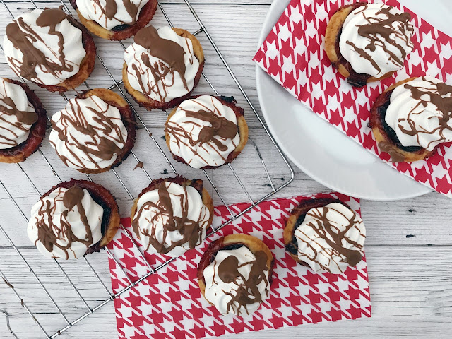 Jam tarts with meringue and chocolate toppings