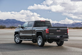 Rear 3/4 view of 2015 GMC Sierra 2500 HD