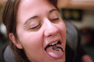 Bizarre Piercing And Tongue Tattooing