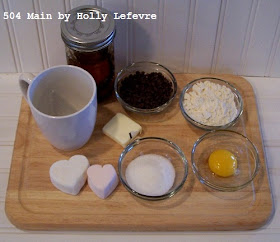 Ingredients to microwave a fudge cake in a mug