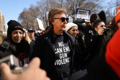 Sir Paul McCartney joins thousands in March For Our Lives protests - an anti-gun march mainly in the United States. The former Beatles member visited the site where his friend and band-mate John Lennon was shot dead on December 8, 1980, Manhattan, New York City, New York, United States.  The main protest is organised by students in the wake of the massacre at Marjory Stoneman Douglas High School. 