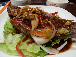 Deep fried whole fish with sambal sauce image