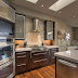 Tratto glass hood in a modern kitchen setting
