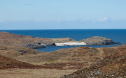 . looked westwards to the white houses of Lower Sanna, and beyond to the . (beach)