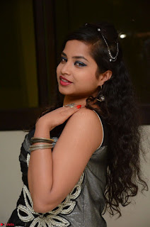 Shrisha Dasari in Sleeveless Short Black Dress At Follow Follow U Audio Launch 046.JPG