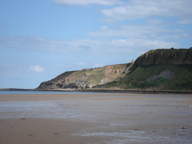 Cayton Bay on a sunny day when the beach is quiet