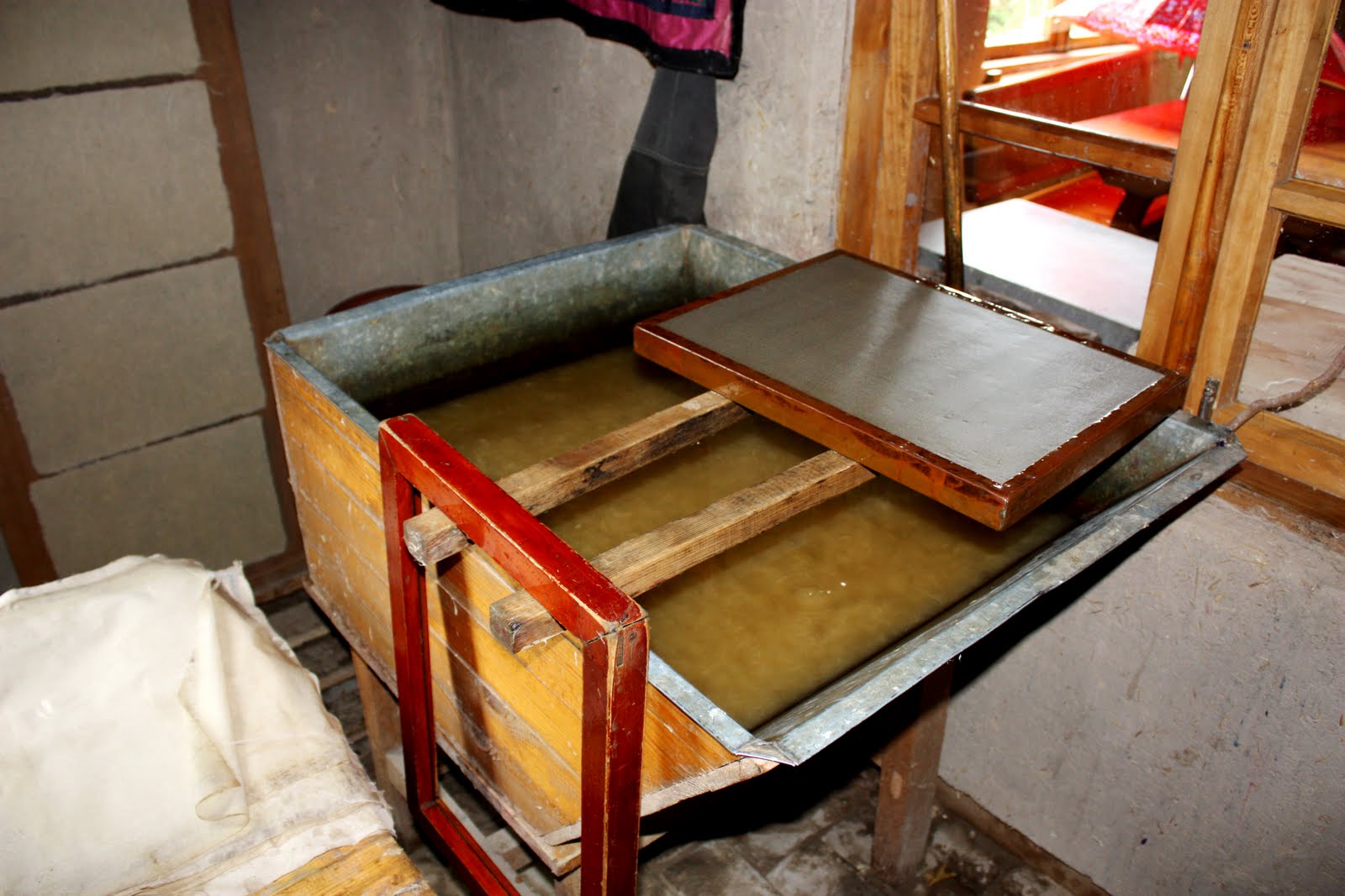 ... flat, the fibres are taken out and hung to dry to become silk paper