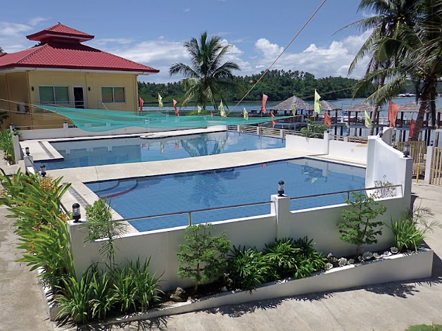 view of swimming pool from a cottage room at Juvie's Resort Hotel and Restaurant in San Roque, Catbalogan Samar