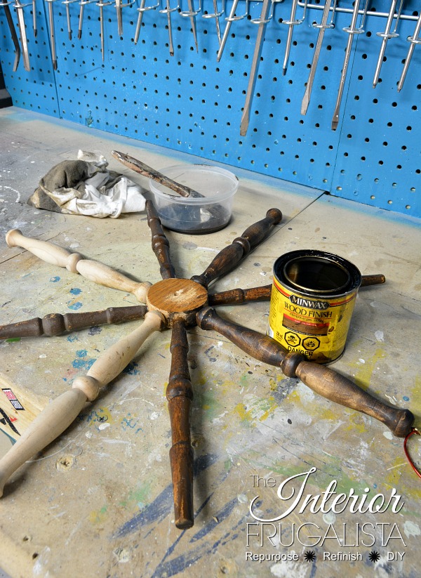 How to make a large wooden snowflake ornament to hang indoors or outdoors for Christmas or Winter decorating made with old repurposed chair spindles.