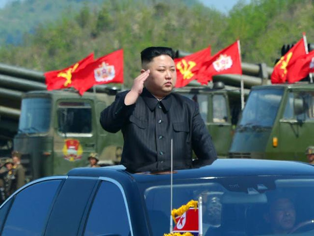 Kim Jong-Un attending the combined fire demonstration of the services of the Korean People's Army.