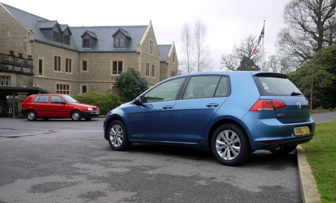 1994 VW Golf Ecomatic next to 2013 Golf version 7