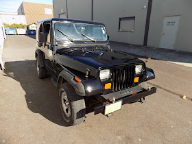 Jeep Wrangler with faded, peeling paint after repairs at Almost Everything Auto Body.