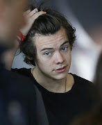 One Direction: Harry Styles at Paris CDG Airport .