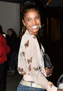 Kim Porter posing for the picture