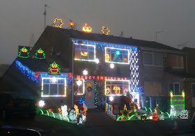 One Semi Detached House Covered in Xmas Lights
