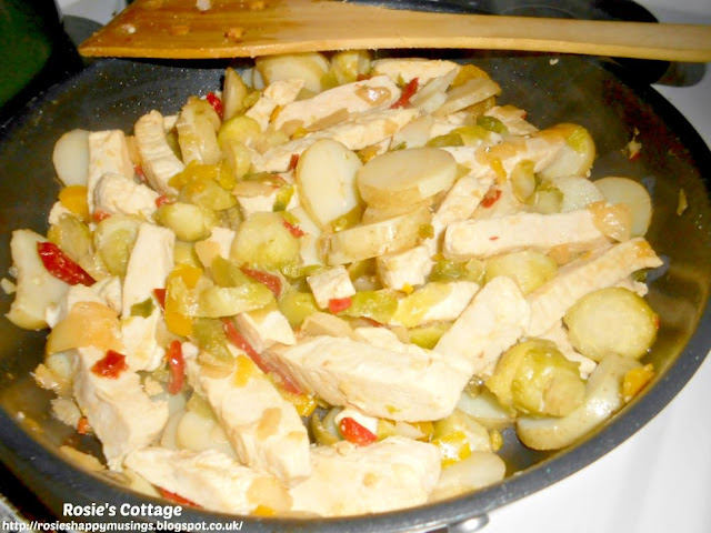 Easiest Ever, Super Yummy, Use What You Have Frittata: Pieces of cooked chicken are then added to the pan with the onions and peppers, followed by the sliced baby potatoes and brussel sprouts. 