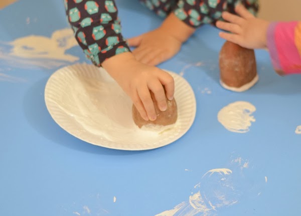 Snowman potato printing- a fun Winter craft for kids