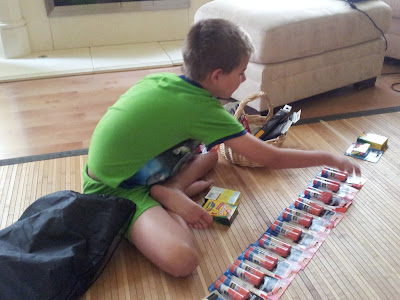 My child is as organized as I am - all the items have to be laid in order on the floor first