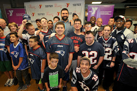 YMCA group photo with Rob Ninkovich and Devin McCourty