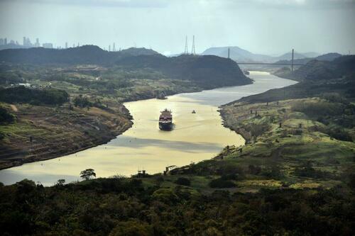 A merchant ship sails along the Panama Canal on March 23, 2015.