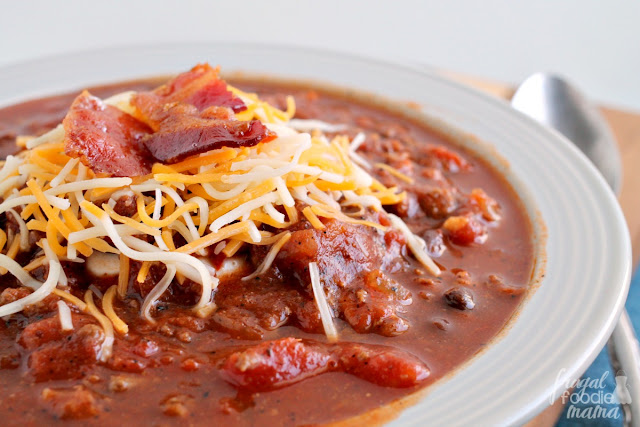 This hearty & comforting homemade chili recipe has two unexpected ingredients in it- ground venison & smoky, thick cut bacon.