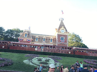 Main Street USA train station at Disneyland with Mickey flowers