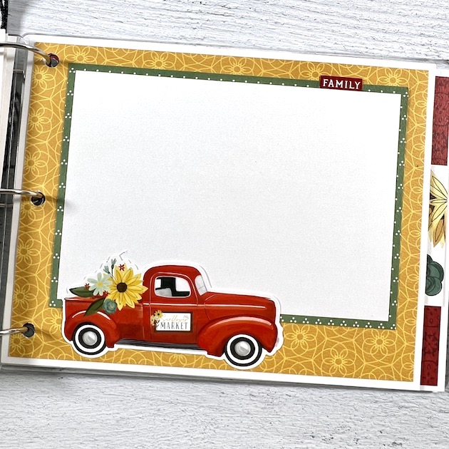 family scrapbook album page with truck and flowers